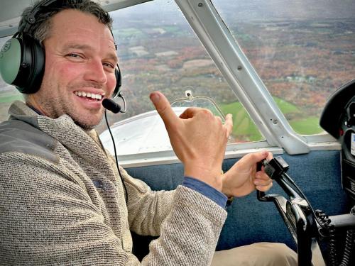 Instructor John McCormick at the controls